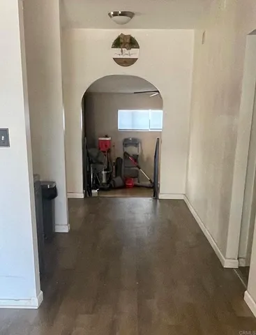 a kitchen with a sink stove and refrigerator