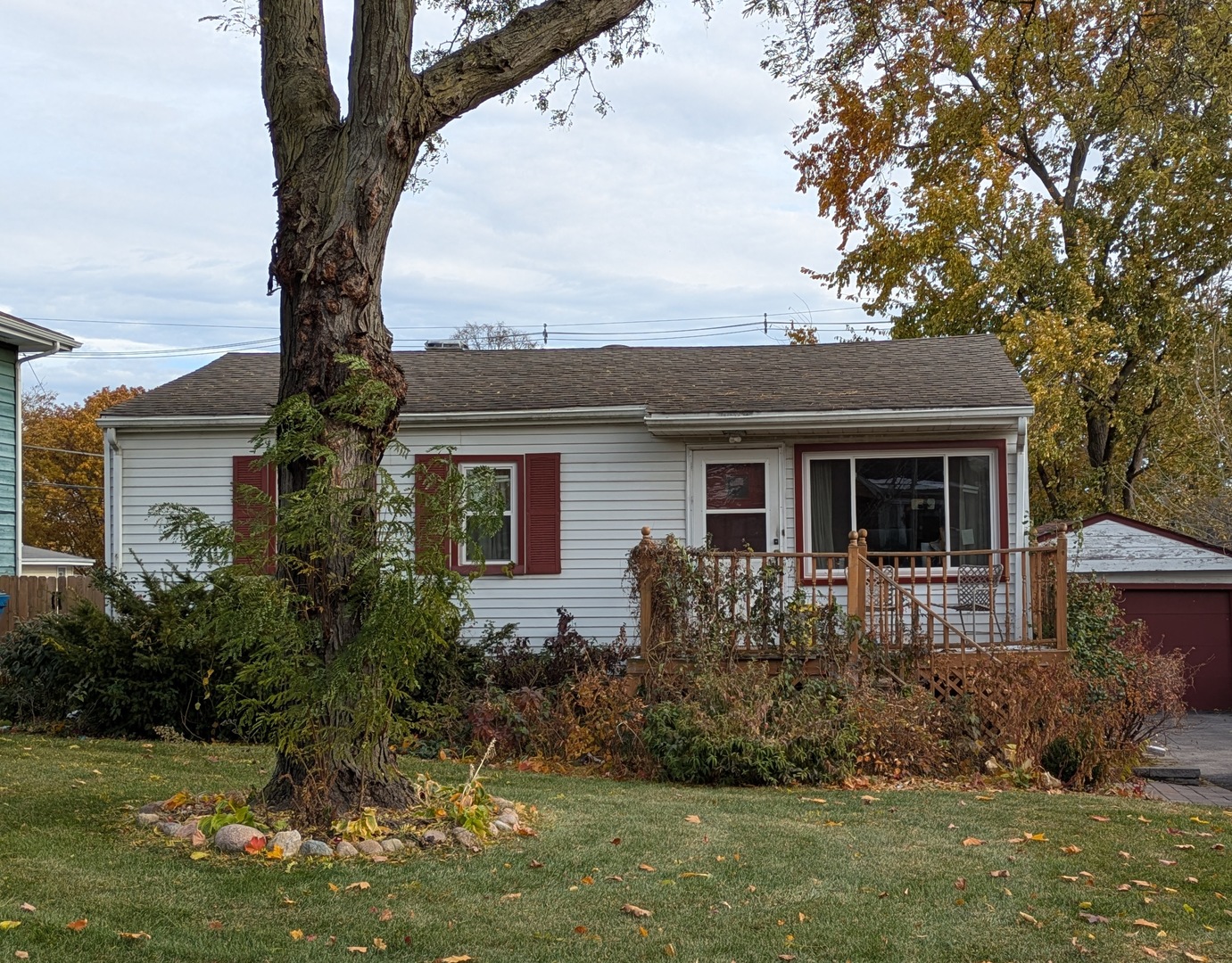 795 North Emroy Avenue Elmhurst, IL 60126 - Photo 1 of 2 a front view of house with yard and trees around