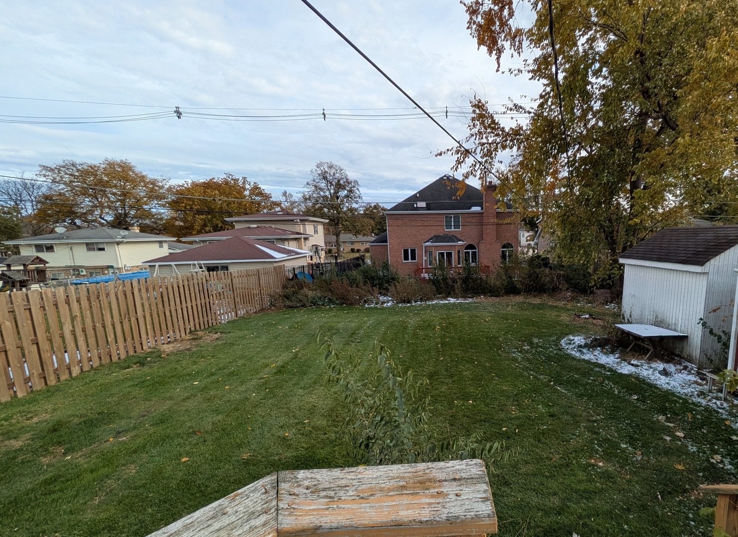 795 North Emroy Avenue Elmhurst, IL 60126 - Photo 2 of 2 a front view of a house with garden