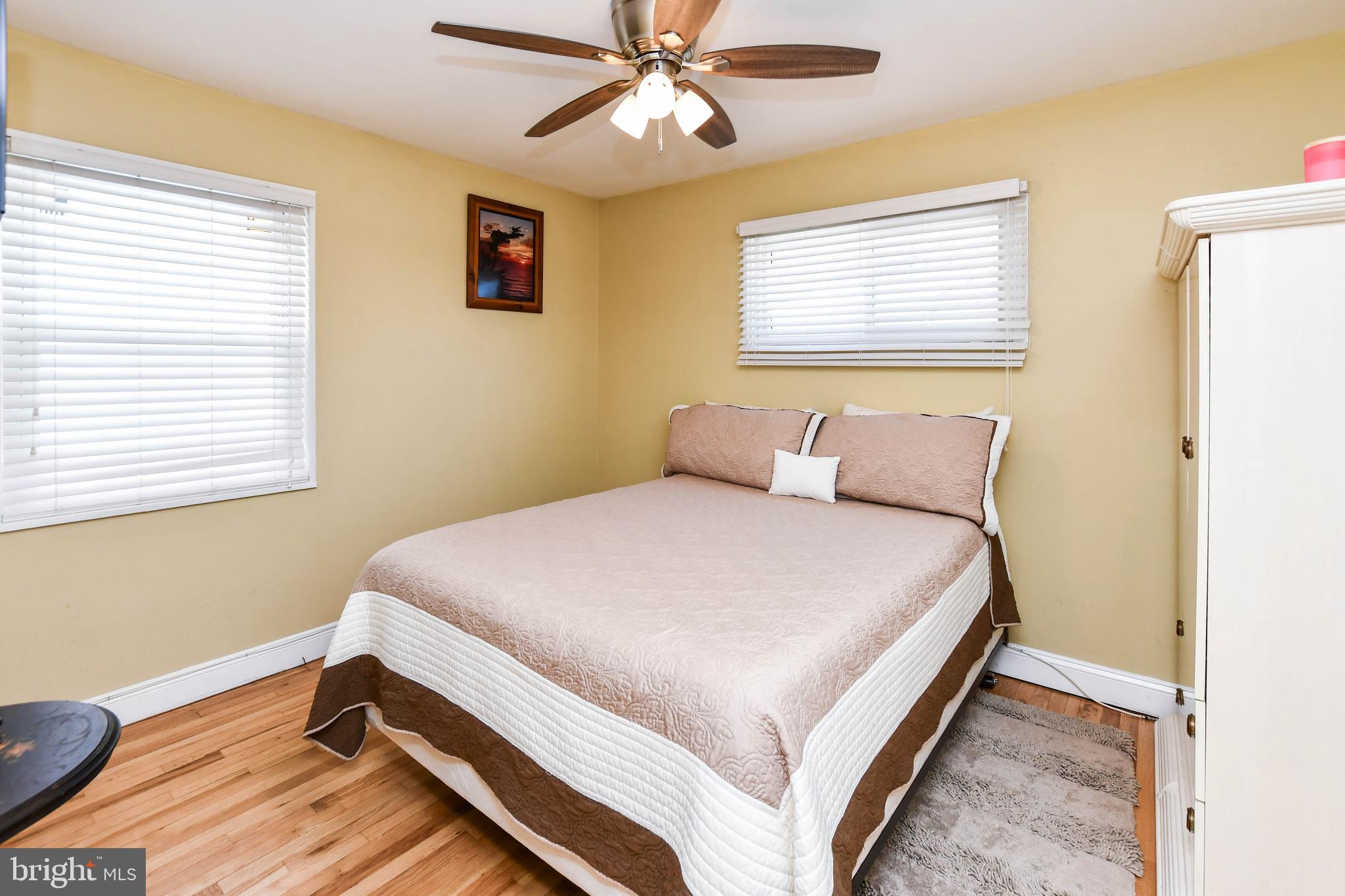 6714 Darby Road Hyattsville, MD 20784 - Photo 17 of 35 a bedroom with a bed and a window