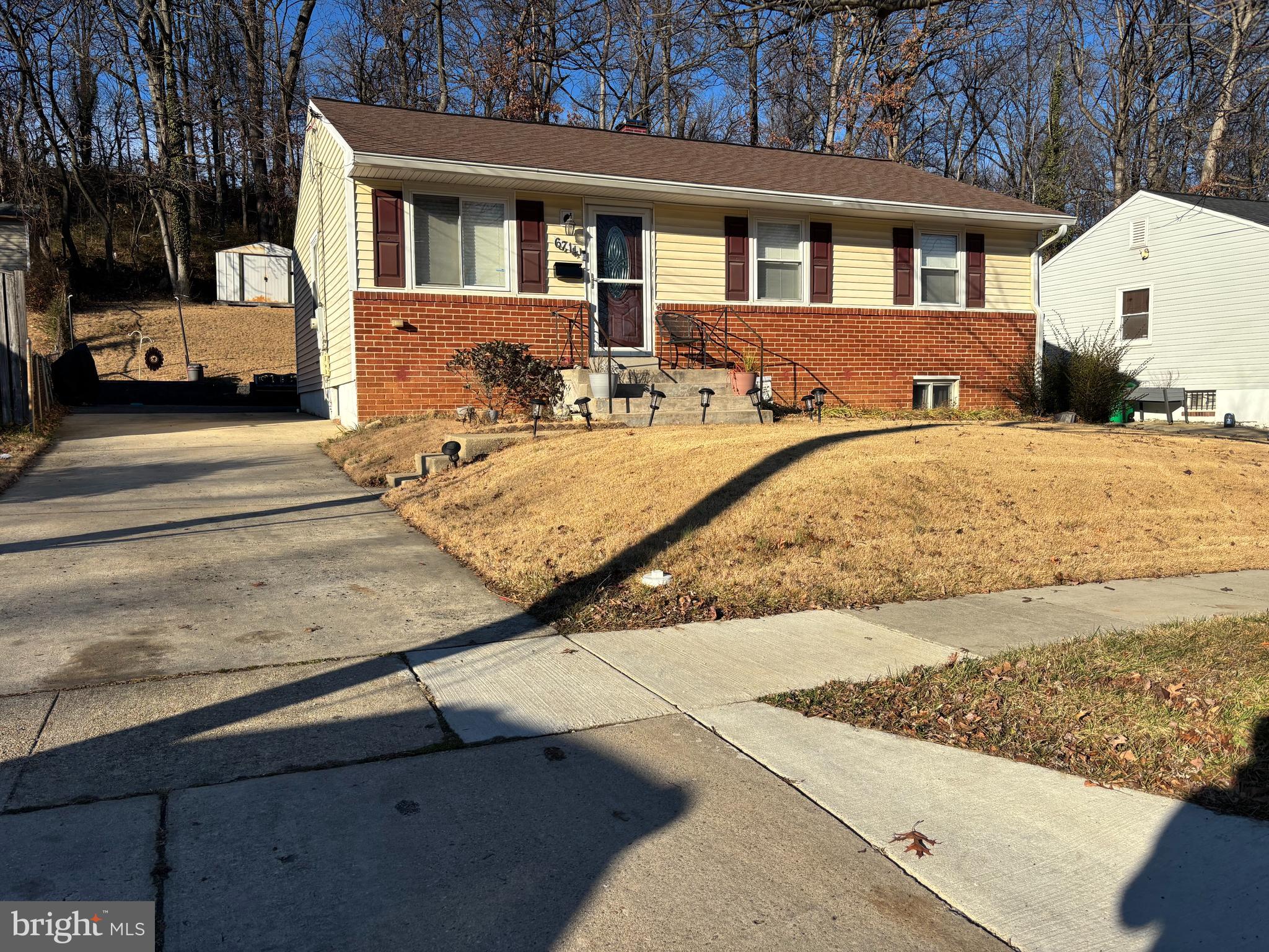 6714 Darby Road Hyattsville, MD 20784 - Photo 2 of 35 a view of a house with snow on the road
