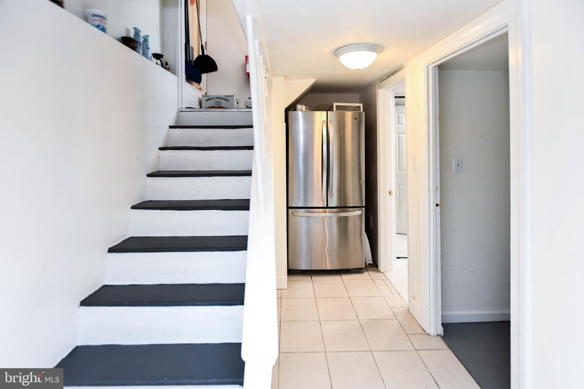 6714 Darby Road Hyattsville, MD 20784 - Photo 23 of 35 a view of entryway with wooden floor and windows