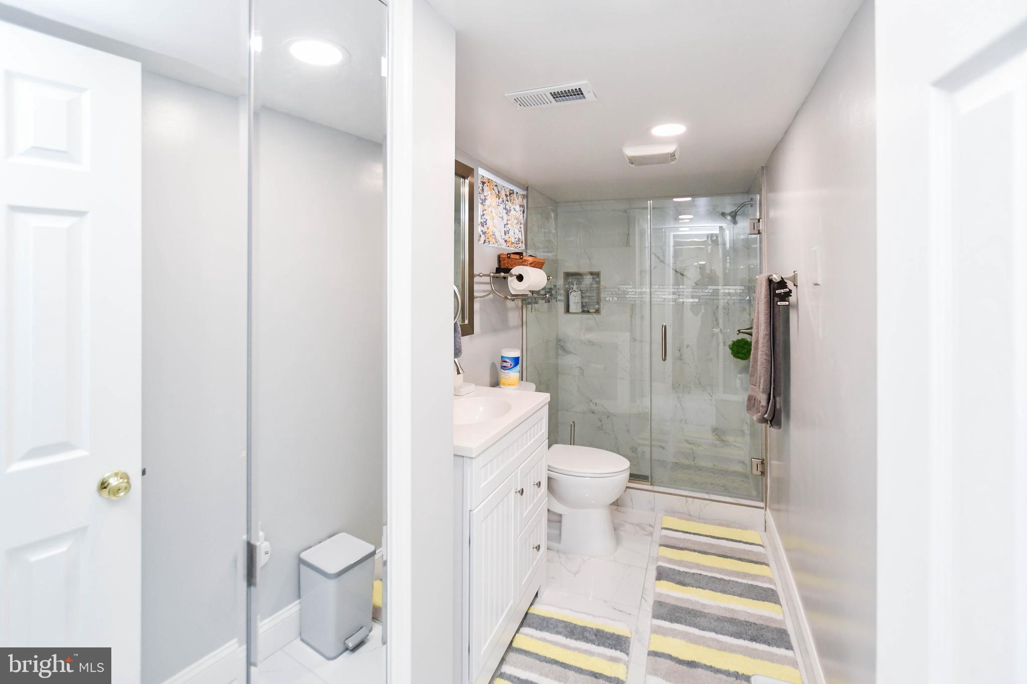 6714 Darby Road Hyattsville, MD 20784 - Photo 32 of 35 a bathroom with a toilet and a shower