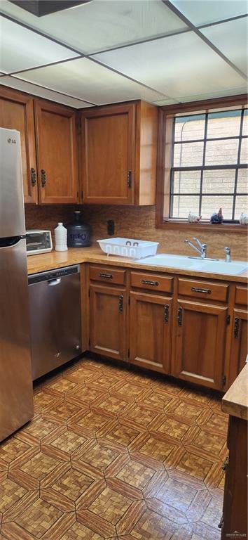 500 Wichita Avenue, Unit 75 McAllen, TX 78503 - Photo 11 of 45 a kitchen with stainless steel appliances granite countertop a sink and cabinets