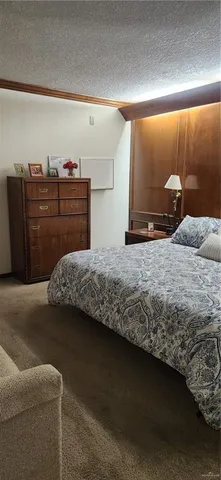 a bedroom with a bed and closet