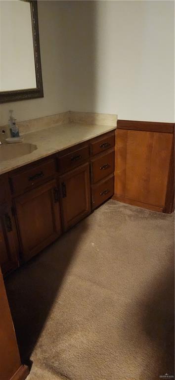 500 Wichita Avenue, Unit 75 McAllen, TX 78503 - Photo 42 of 45 a bathroom with a sink and a mirror