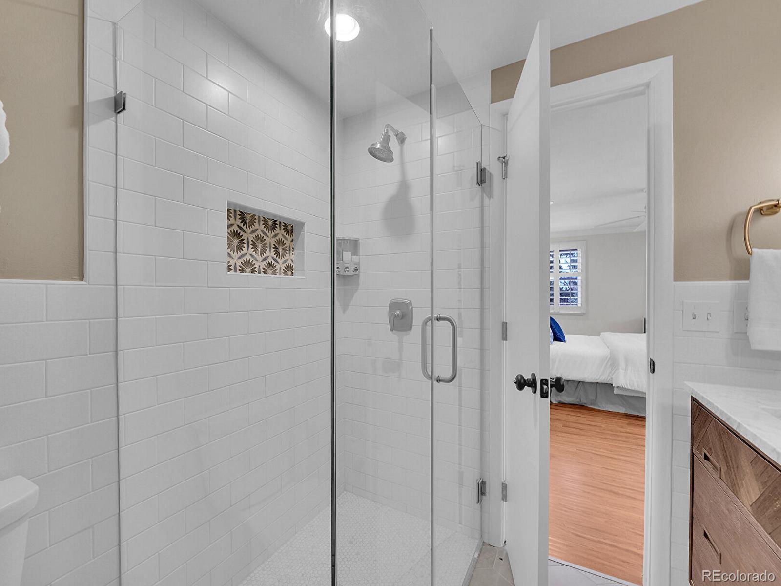 6849 South Elizabeth Circle Centennial, CO 80122 - Photo 24 of 44 a bathroom with a shower