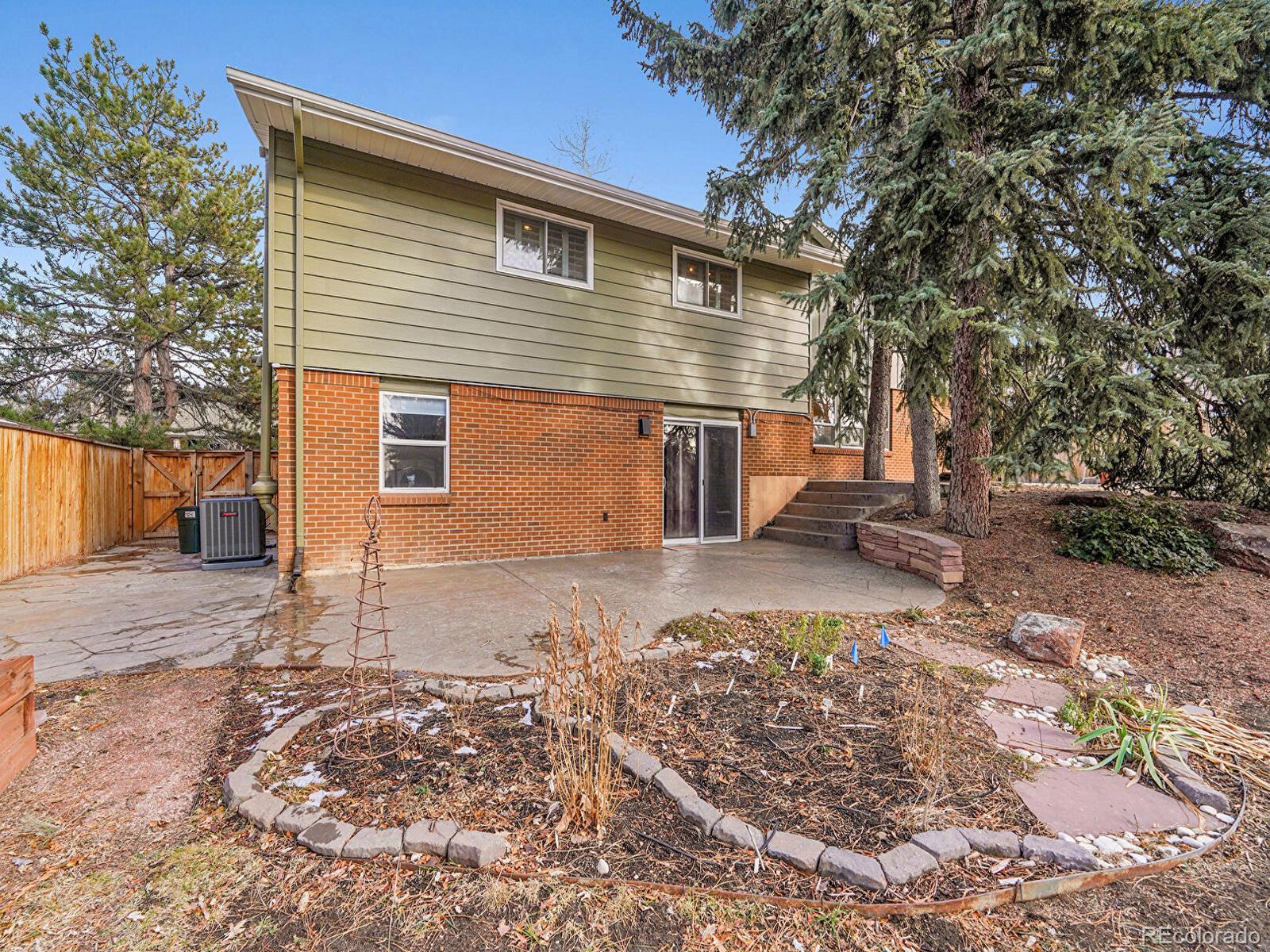 6849 South Elizabeth Circle Centennial, CO 80122 - Photo 33 of 44 a view of a house with a yard