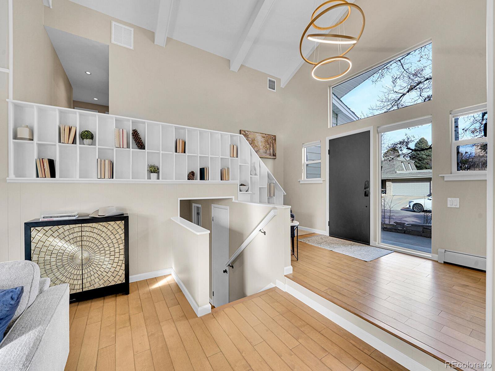 6849 South Elizabeth Circle Centennial, CO 80122 - Photo 5 of 44 a view of living room with furniture and flat screen tv
