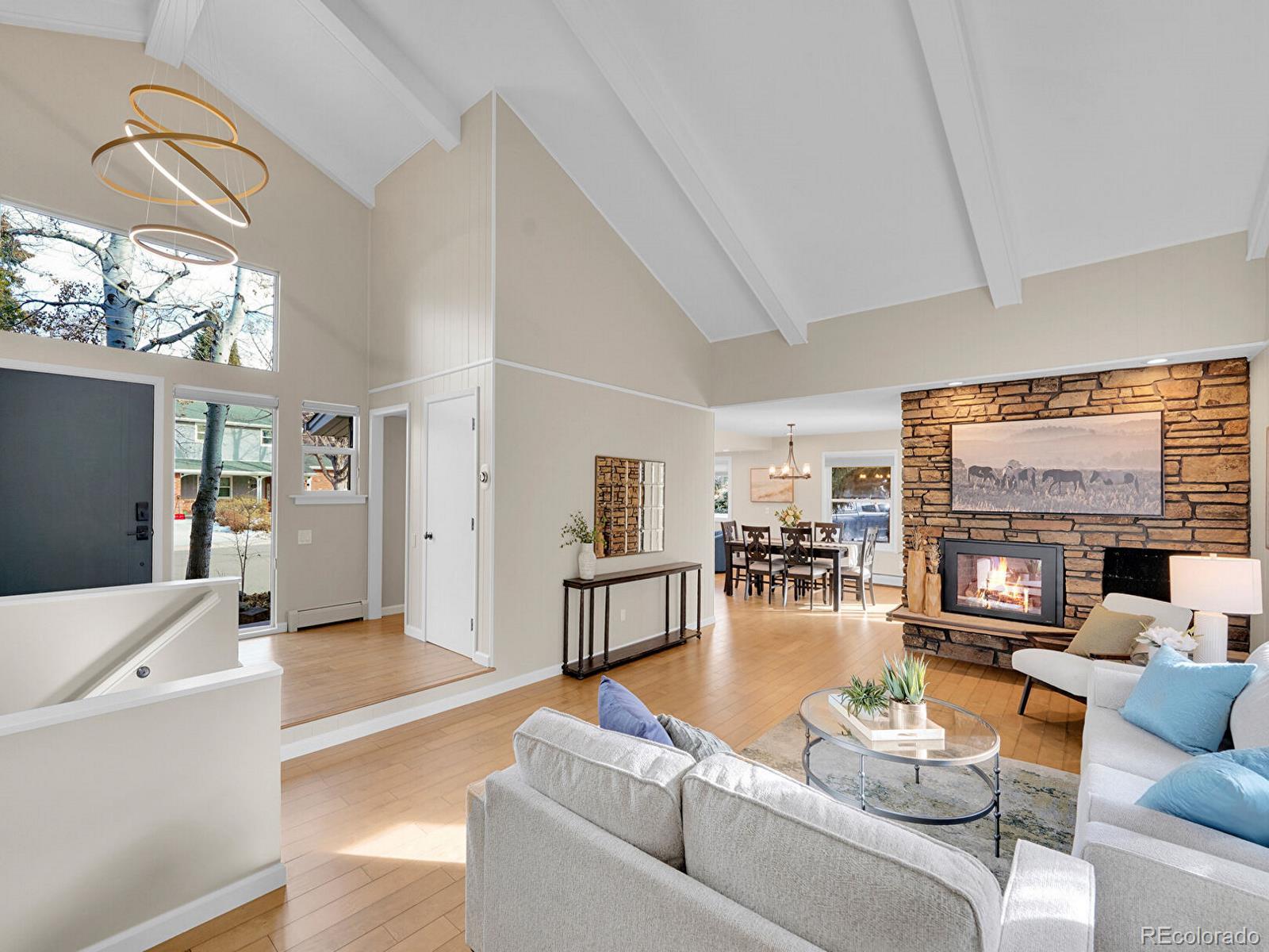 6849 South Elizabeth Circle Centennial, CO 80122 - Photo 6 of 44 a living room with furniture and a table