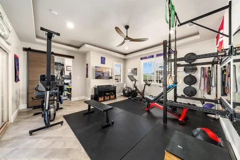 a view of a room with gym equipment