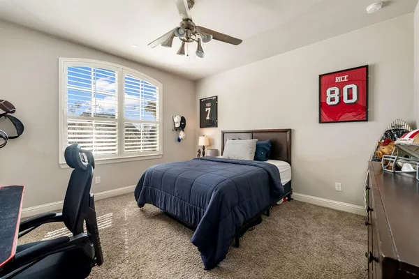 a bedroom with a bed and furniture