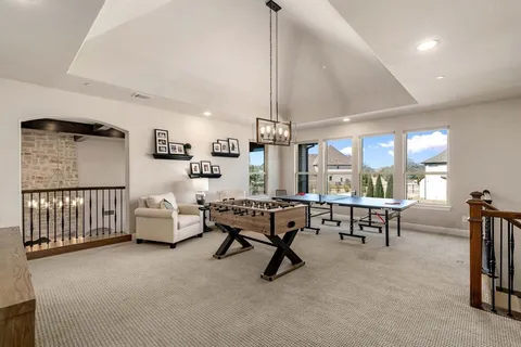 a living room with furniture and a table