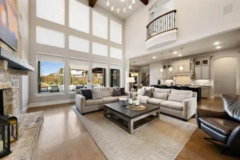 a living room with furniture fireplace and a flat screen tv