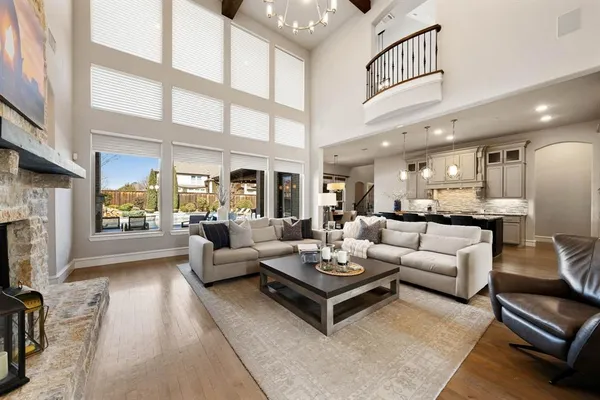 a living room with furniture fireplace and a flat screen tv