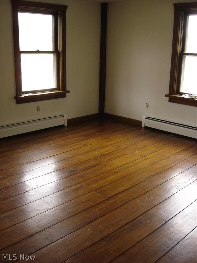 9733 Madison Road Montville, OH 44064 - Photo 21 of 31 Master bedroom - these wood planks are 8 1/2" wide.