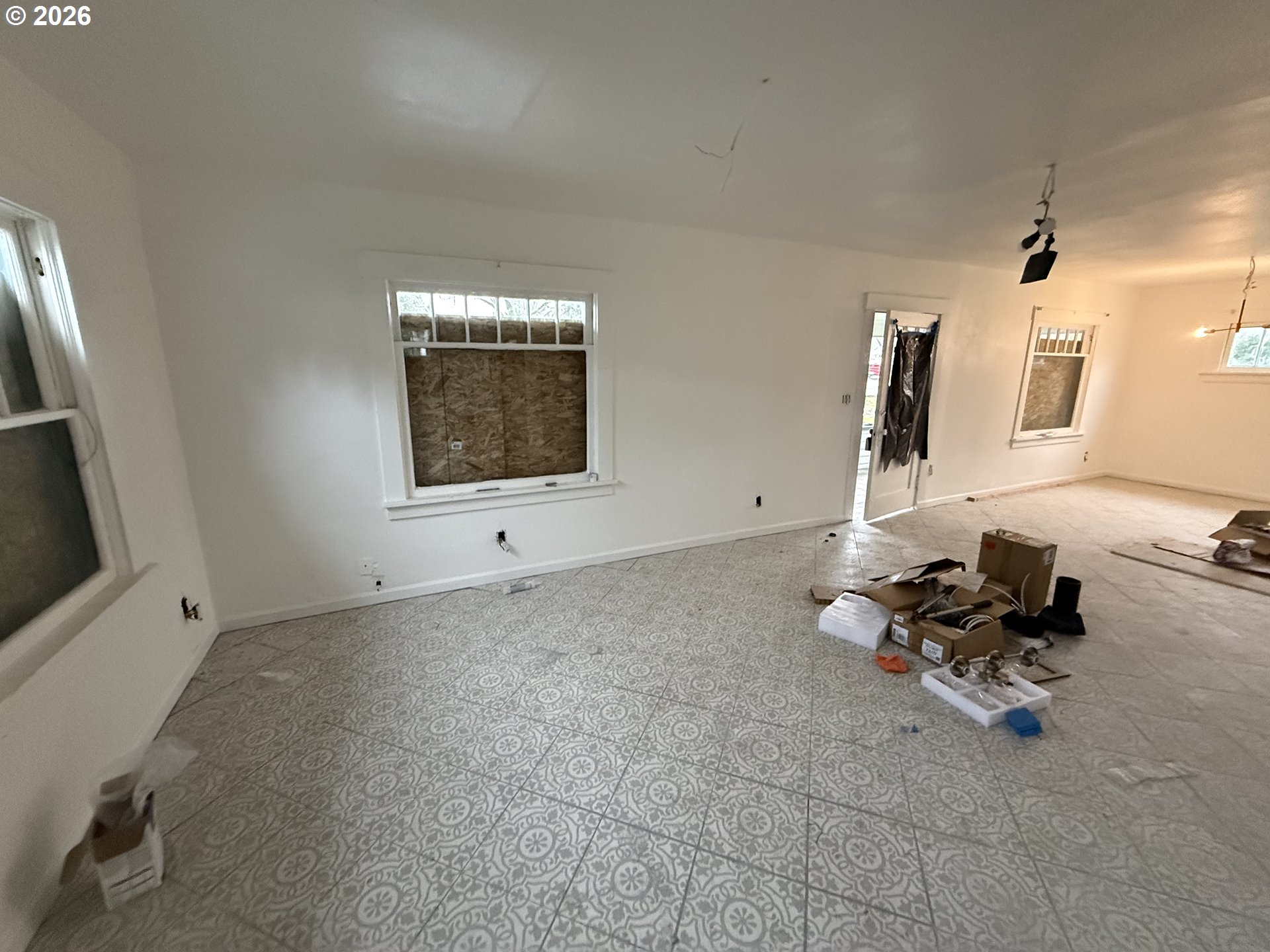 3945 Southwest 185th Avenue Beaverton, OR 97078 - Photo 10 of 26 a room with gym equipment and a flat screen tv