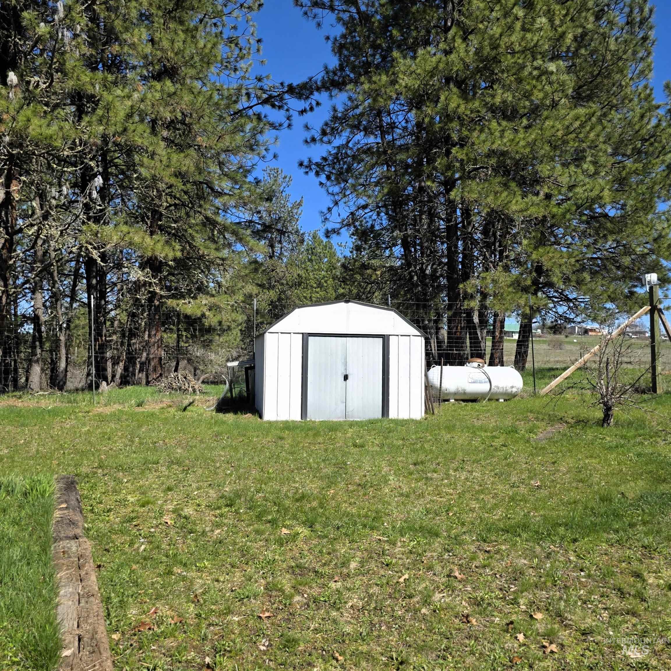 637 Leitch Creek Road Kooskia, ID 83539 - Photo 31 of 38 View of yard featuring a shed