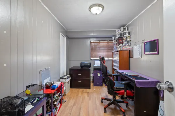 a view of a workspace with furniture