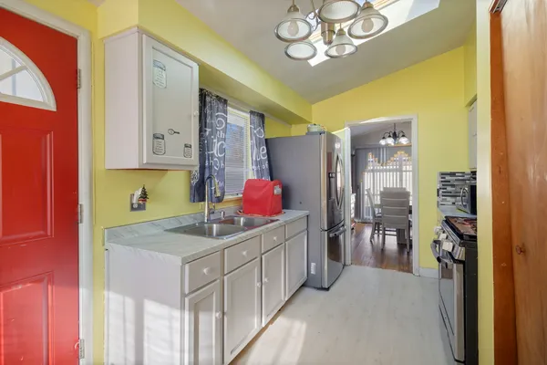 a kitchen that has a lot of cabinets