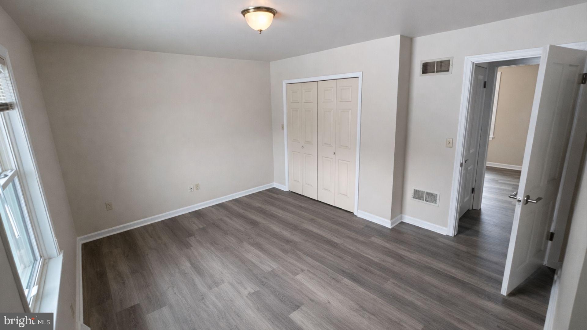 2134 Cemetery Road Seven Valleys, PA 17360 - Photo 5 of 10 a view of a hallway with wooden floor