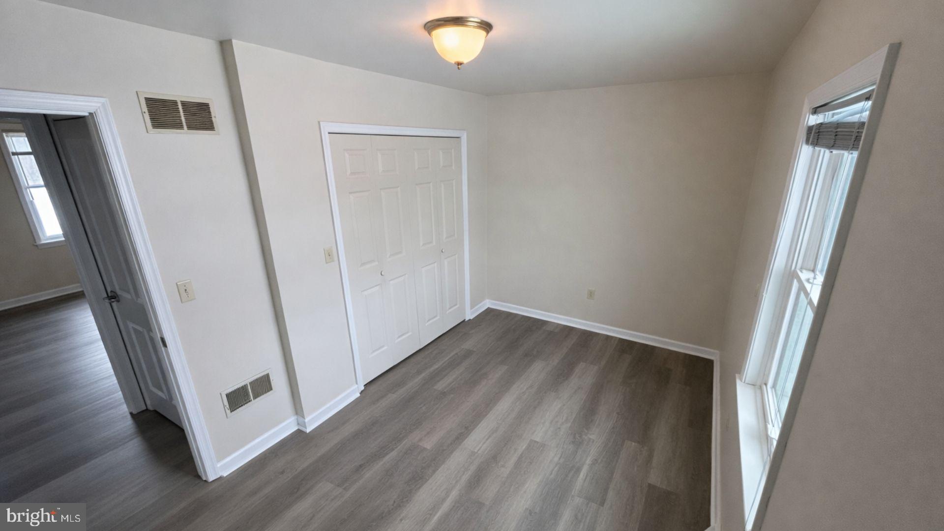 2134 Cemetery Road Seven Valleys, PA 17360 - Photo 6 of 10 a view of a hallway with wooden floor