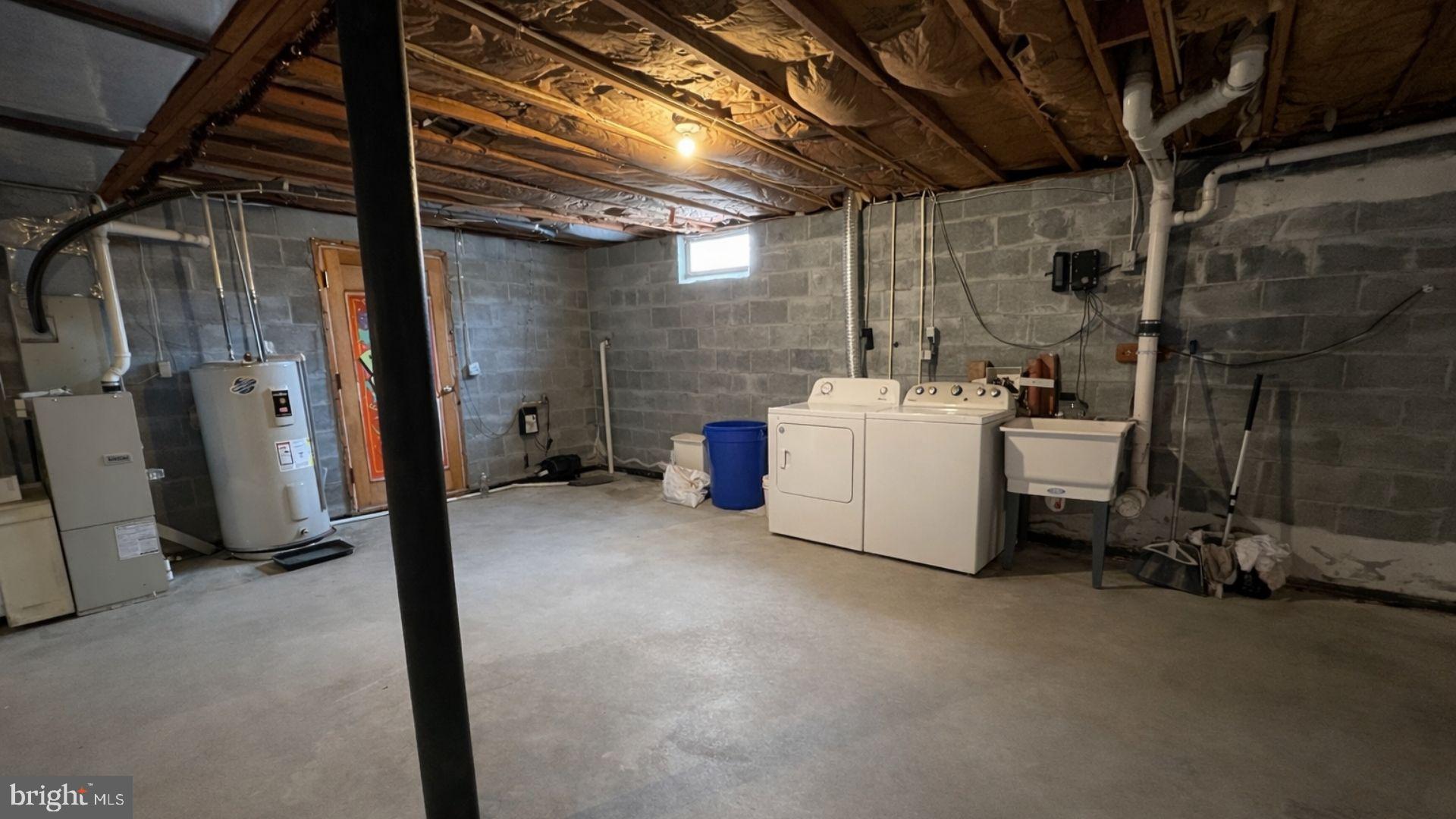 2134 Cemetery Road Seven Valleys, PA 17360 - Photo 10 of 10 a utility room with dryer and washer