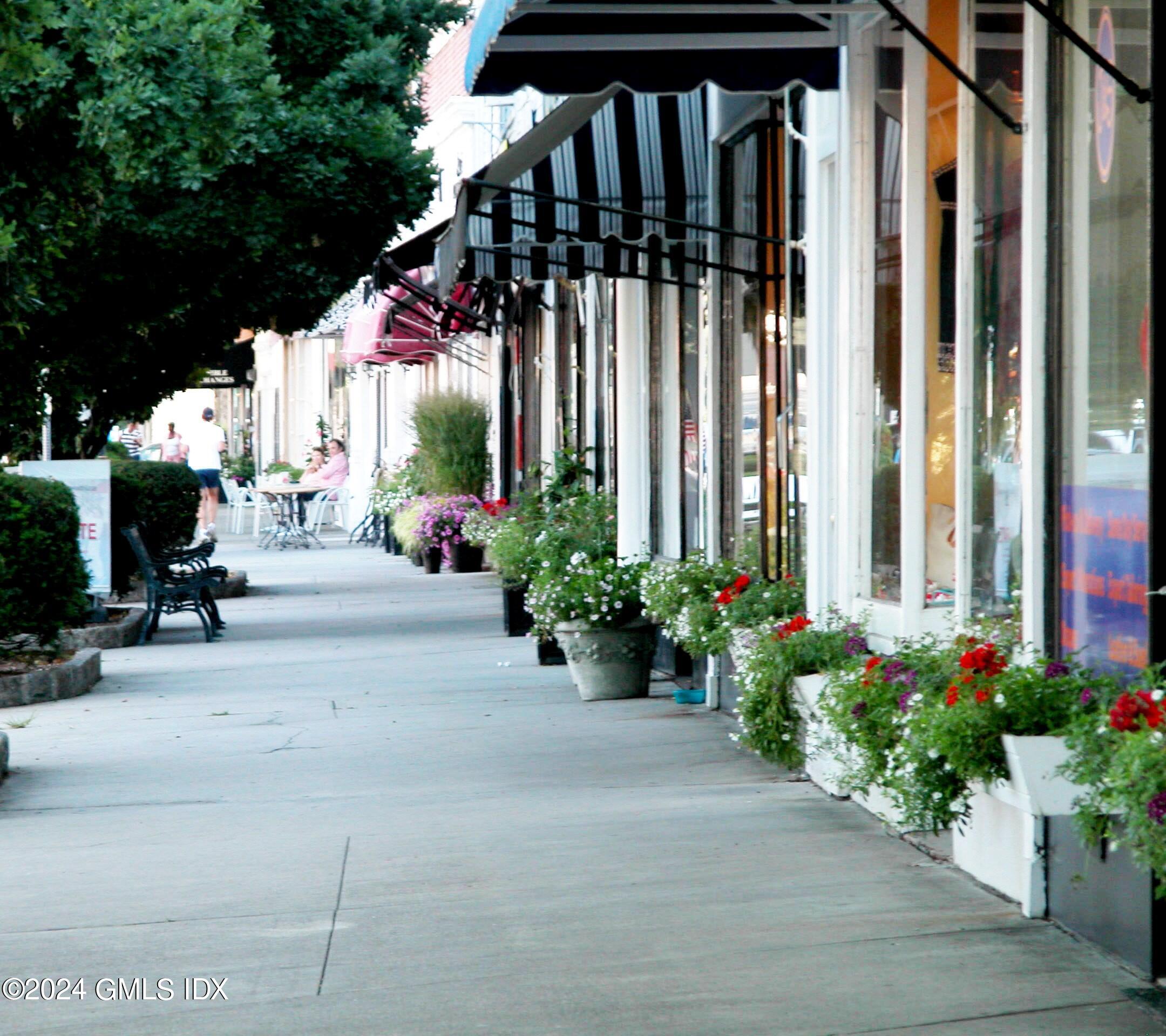 22 Keofferam Road, Unit REAR Old Greenwich, CT 06870 - Photo 13 of 15 a front view of a house having patio