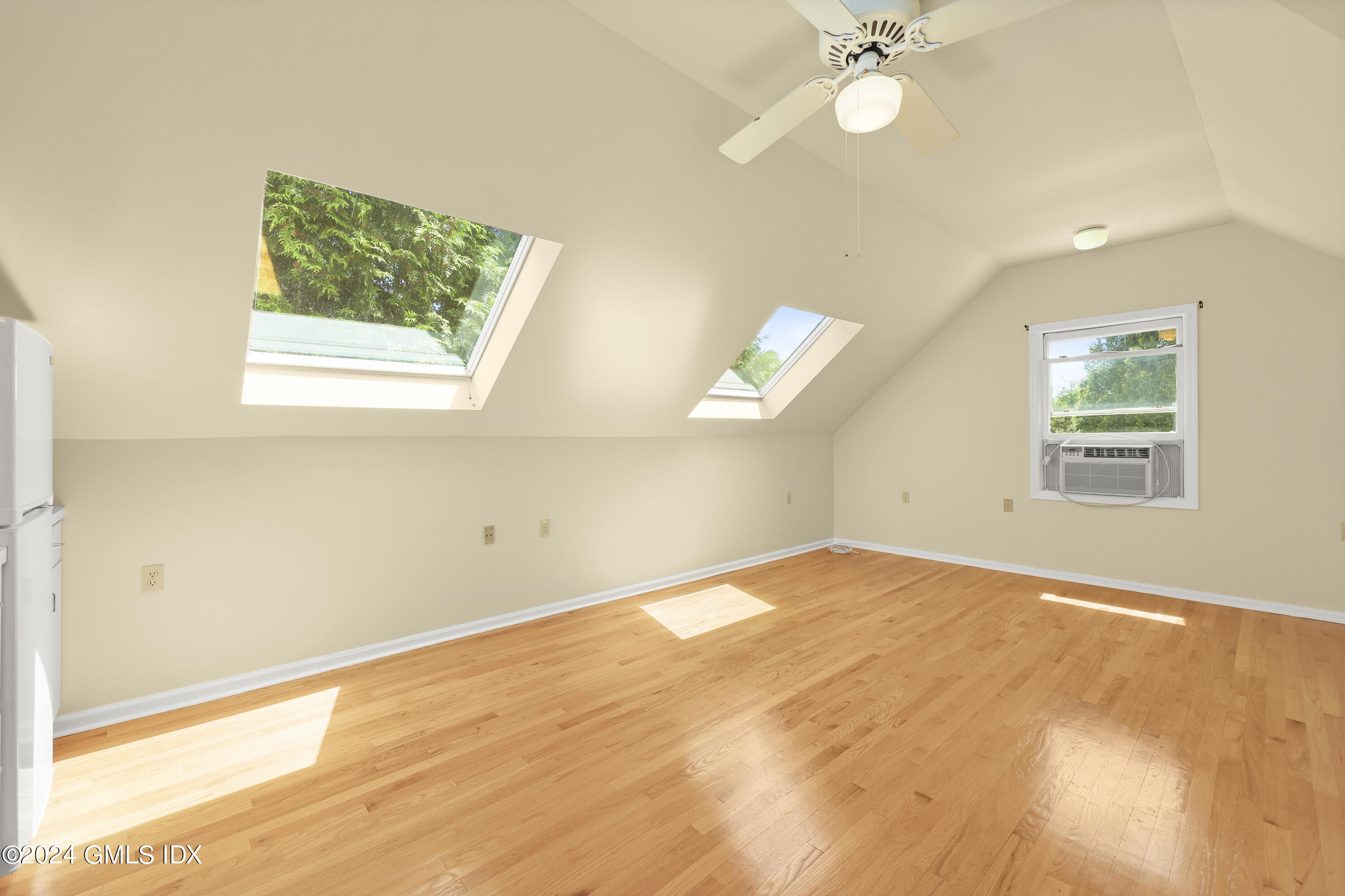 22 Keofferam Road, Unit REAR Old Greenwich, CT 06870 - Photo 3 of 15 a view of an empty room with a window