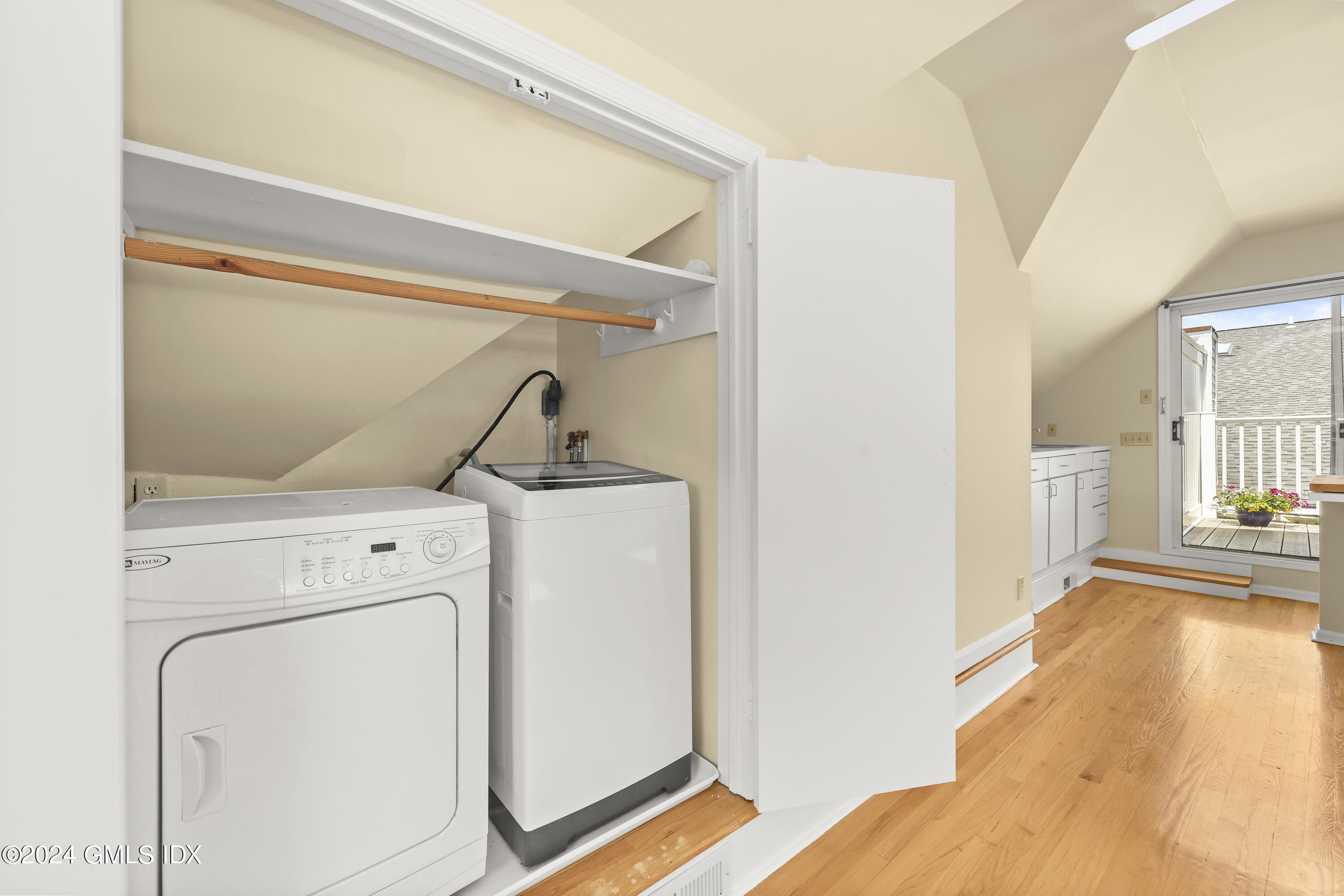 22 Keofferam Road, Unit REAR Old Greenwich, CT 06870 - Photo 8 of 15 a view of a storage & utility room with washer and dryer