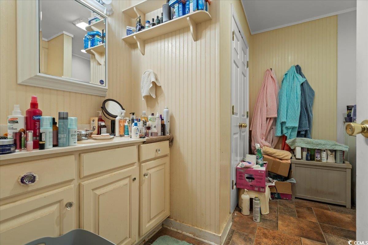2776 Holly Road Marion, SC 29571 - Photo 15 of 29 Bathroom with stone finish flooring, ornamental mo