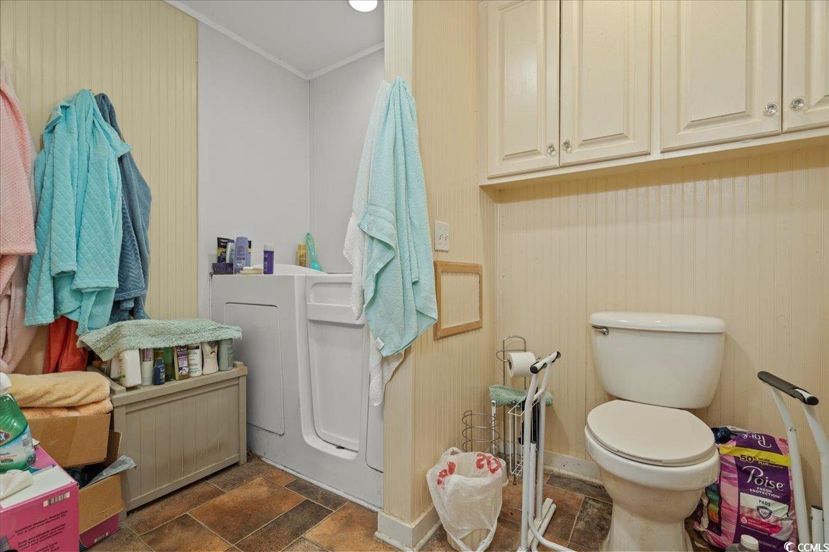 2776 Holly Road Marion, SC 29571 - Photo 16 of 29 Bathroom featuring ornamental molding, stone finis