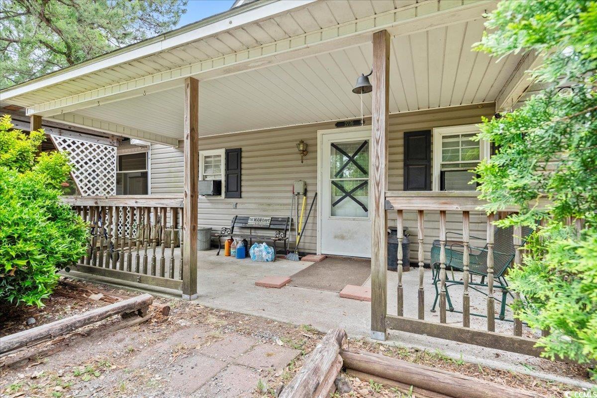 2776 Holly Road Marion, SC 29571 - Photo 2 of 29 Property entrance with covered porch and cooling u