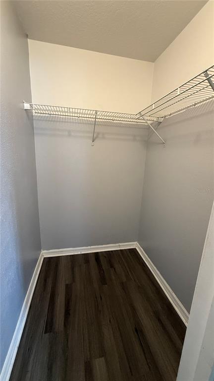 2210 Nicollett Way Leesburg, FL 34748 - Photo 27 of 31 a view of a room with racks on the wall