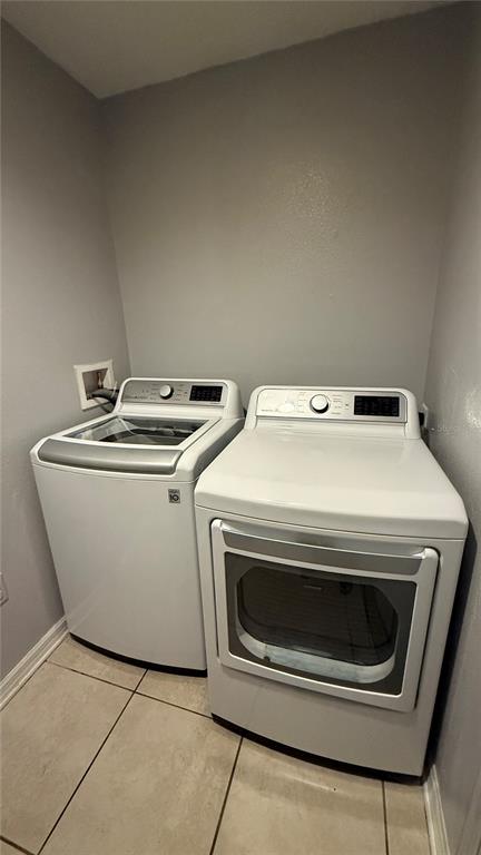 2210 Nicollett Way Leesburg, FL 34748 - Photo 28 of 31 a utility room with dryer and washer