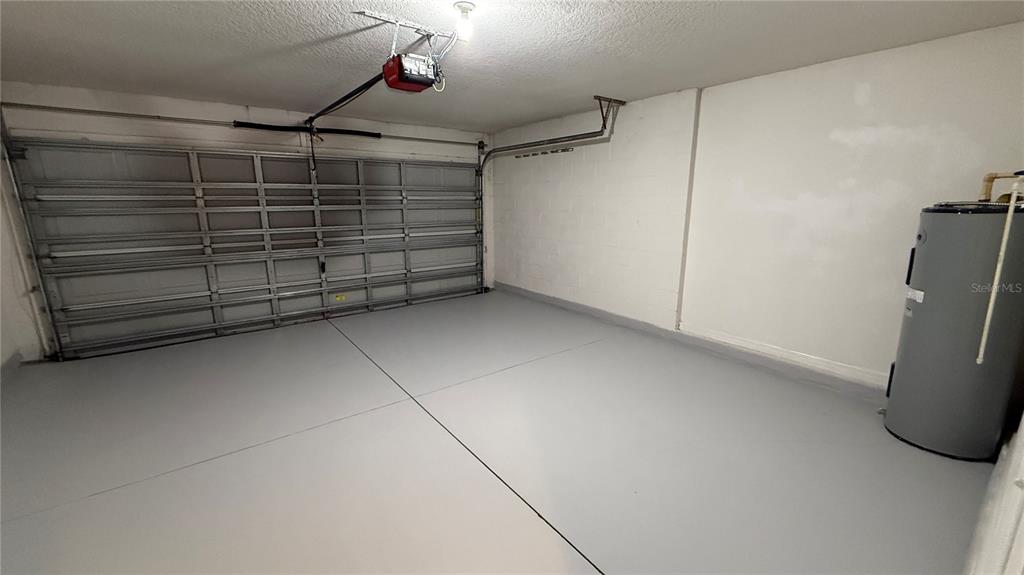 2210 Nicollett Way Leesburg, FL 34748 - Photo 29 of 31 a view of empty room with wooden walls