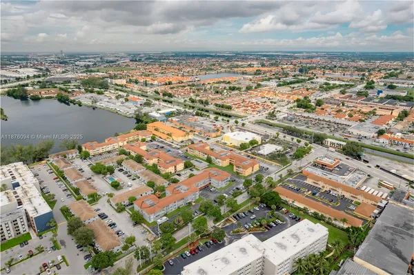 an aerial view of a city with ocean view