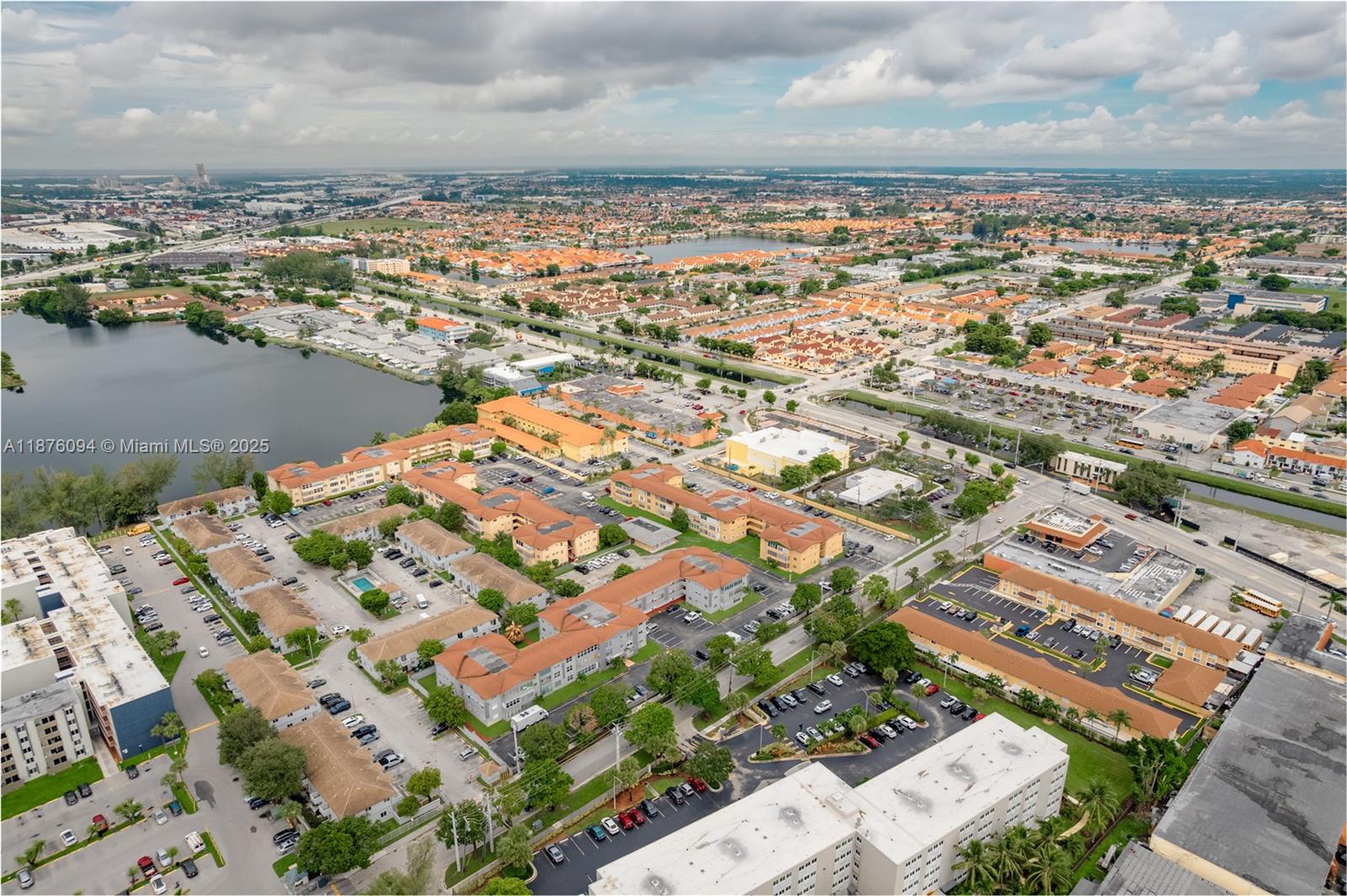120 Royal Palm Road, Unit 315 Hialeah Gardens, FL 33016 - Photo 14 of 15 an aerial view of a city with ocean view