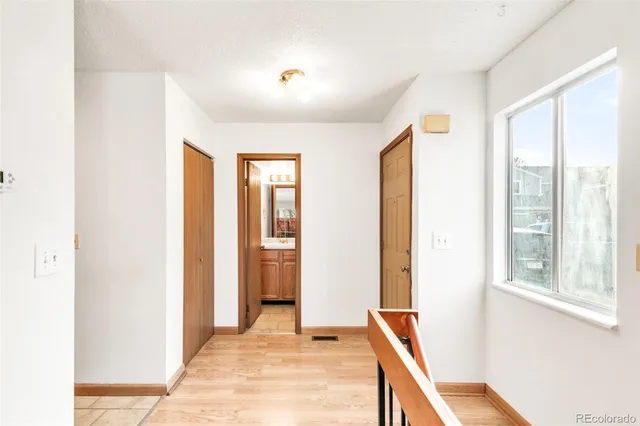 a view of an empty room and window