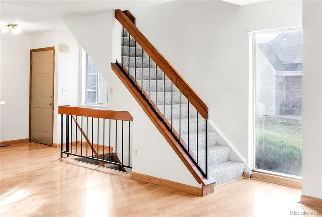 a view of a hallway with staircase