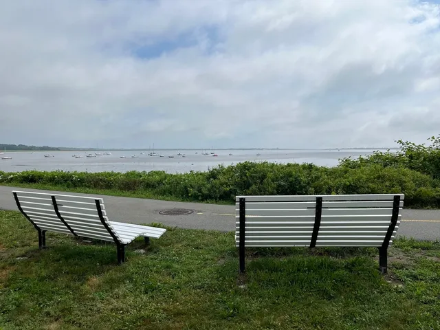 a view of a bench in a field