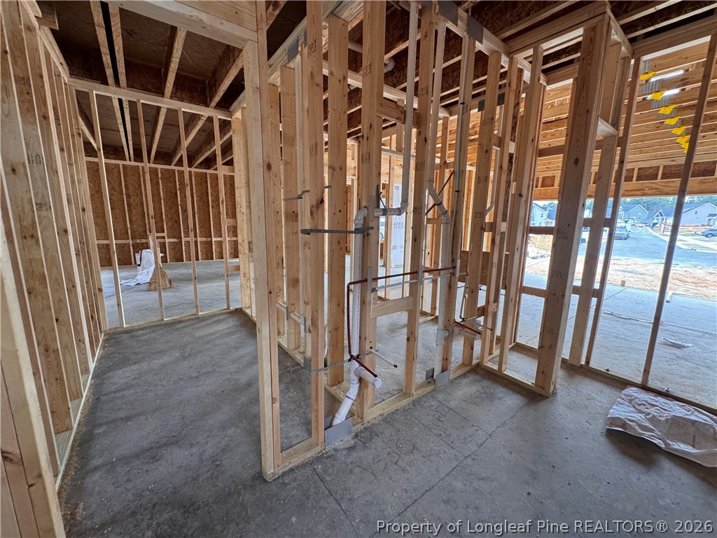 298 Rough Rdg Trail Aberdeen, NC 28315 - Photo 11 of 25 a view of an empty room with stairs