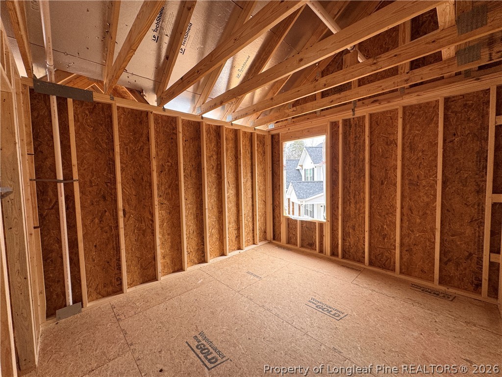 298 Rough Rdg Trail Aberdeen, NC 28315 - Photo 13 of 25 a view of a room with wooden walls