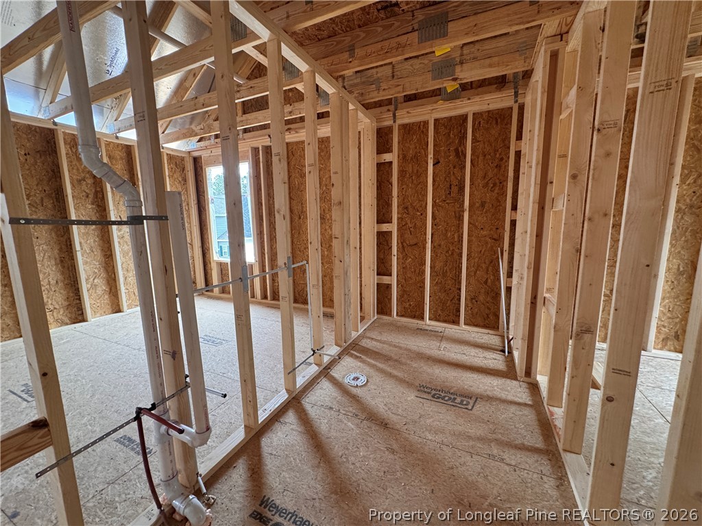 298 Rough Rdg Trail Aberdeen, NC 28315 - Photo 14 of 25 a view of a door with wooden fence