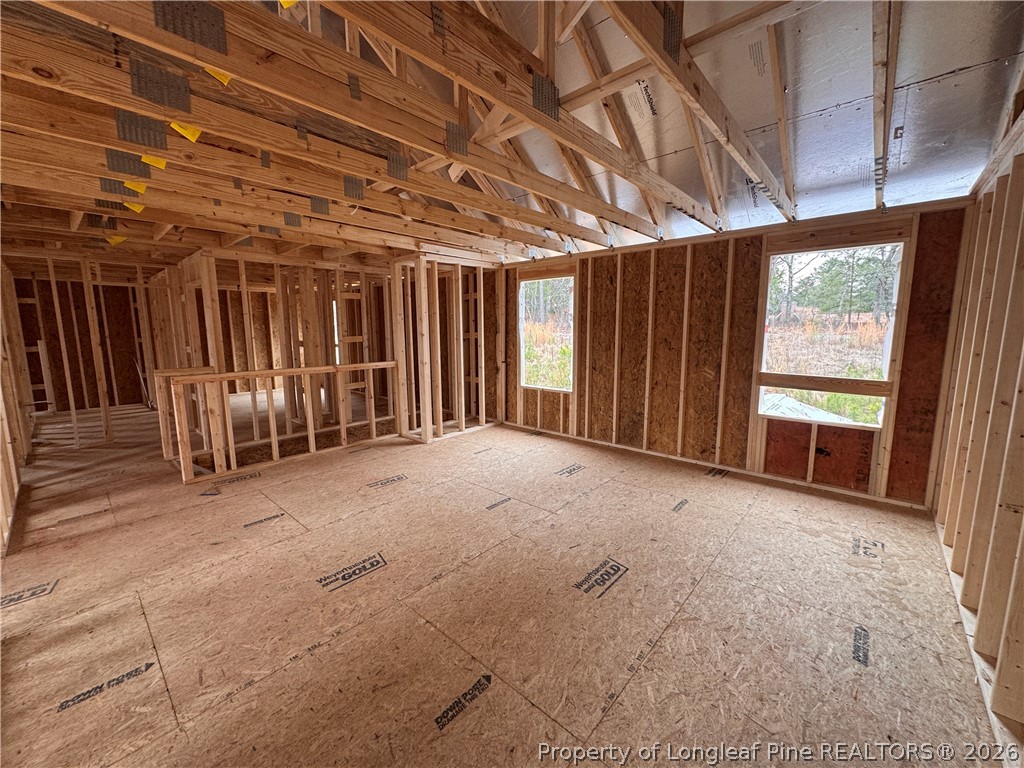 298 Rough Rdg Trail Aberdeen, NC 28315 - Photo 19 of 25 a view of an empty room with windows