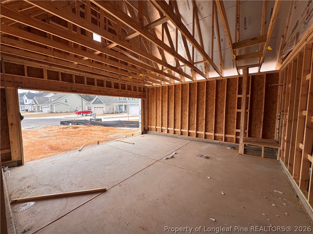 298 Rough Rdg Trail Aberdeen, NC 28315 - Photo 22 of 25 a view of an empty room with wooden walls