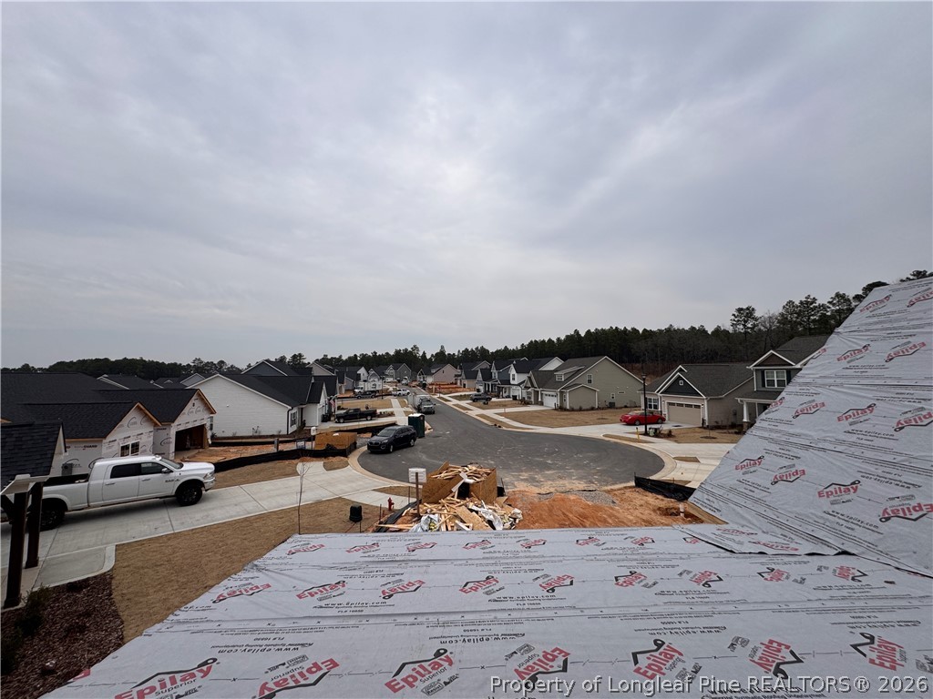 298 Rough Rdg Trail Aberdeen, NC 28315 - Photo 25 of 25 an outdoor space with lounge chair