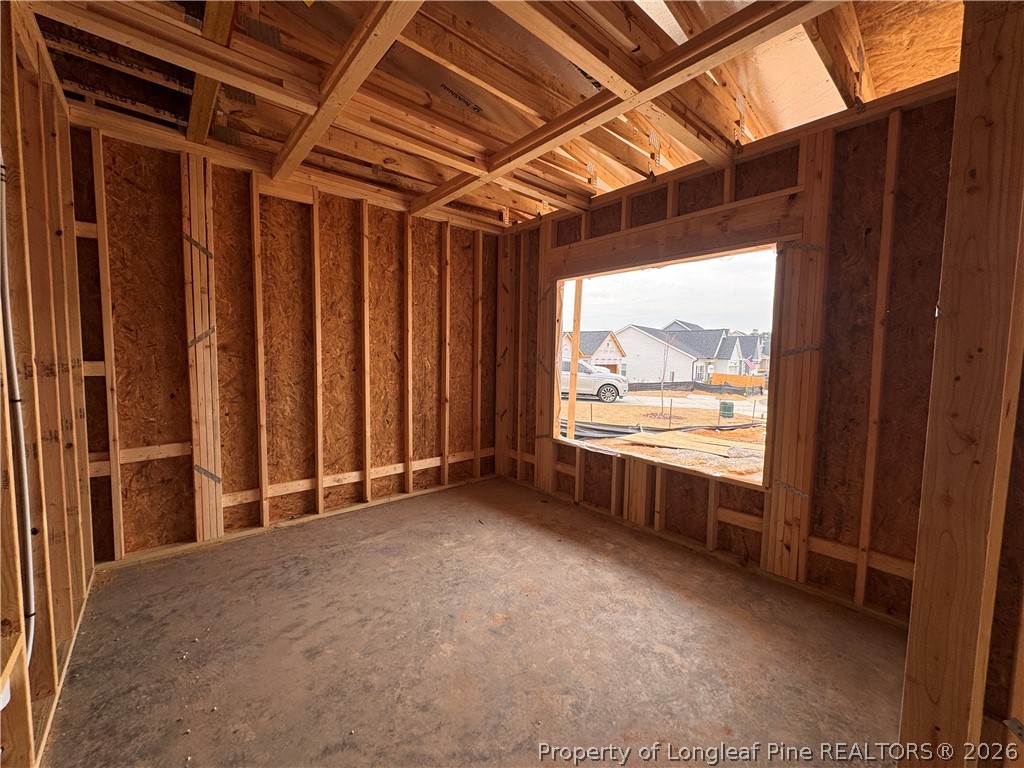 298 Rough Rdg Trail Aberdeen, NC 28315 - Photo 3 of 25 a view of an empty room with a window