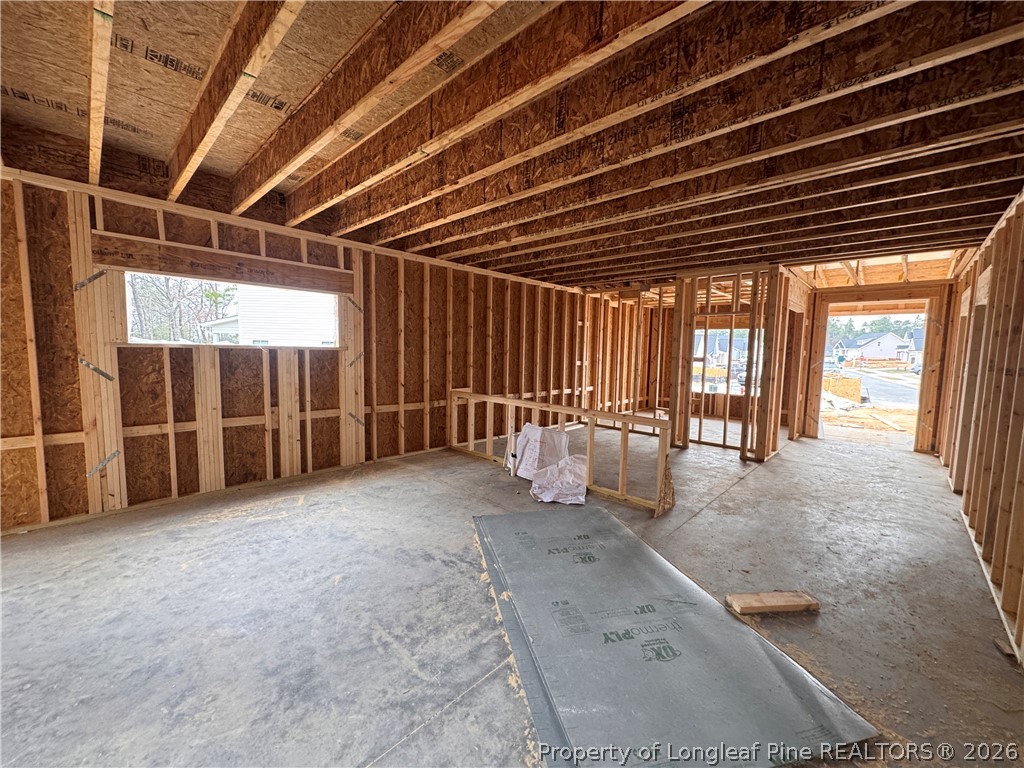298 Rough Rdg Trail Aberdeen, NC 28315 - Photo 7 of 25 a view of an empty room with windows
