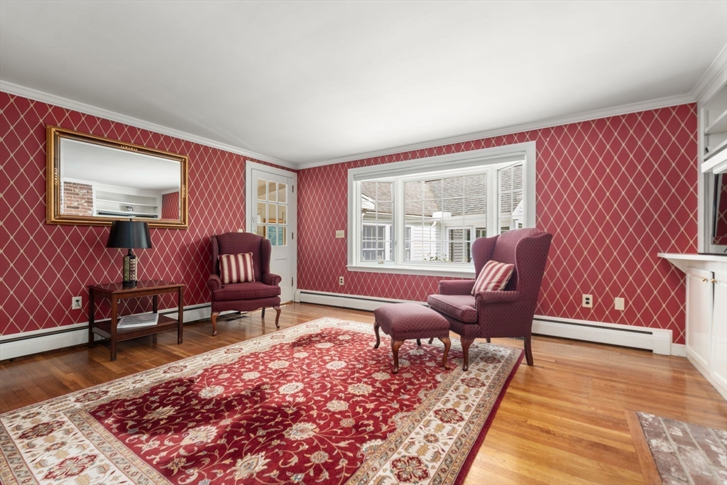73 Greylock Road Wellesley, MA 02481 - Photo 13 of 26 a living room with furniture rug and wooden floor